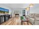 Beautiful living room with wood flooring and neutral walls, offering a bright and welcoming space at 2170 Americus S Blvd # 6, Clearwater, FL 33763