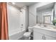 This bathroom offers a shower-tub combo, a large mirror and great lighting to make for an exquisite space at 2710 Chestnut Creek Pl, Brandon, FL 33510