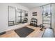 Bright home gym featuring mirrors, weights, and exercise equipment to support a healthy lifestyle at 2710 Chestnut Creek Pl, Brandon, FL 33510