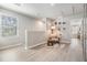 Cozy loft area with wood floors, natural light, and a comfortable seating nook at 2710 Chestnut Creek Pl, Brandon, FL 33510
