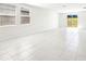 Spacious living room with large windows and recessed lighting at 31640 Malbec Dr, Brooksville, FL 34602
