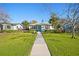 Well-manicured lawn and updated landscaping accentuate this home's curb appeal at 343 37Th Ne Ave, St Petersburg, FL 33704