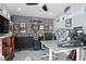 Well-lit home office with marble floors, a large desk, and plenty of wall decor at 343 37Th Ne Ave, St Petersburg, FL 33704