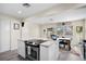 Beautiful kitchen with modern appliances and countertops, open to dining area with natural light at 343 37Th Ne Ave, St Petersburg, FL 33704