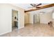 Bonus room featuring wood beams, recessed lighting, tile flooring, and adjacent bathroom at 3543 Stokes Dr, Sarasota, FL 34232