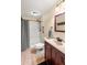 Bathroom featuring shower, vanity, and neutral color palette at 37713 Florida Ave, Dade City, FL 33525