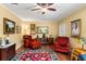 Cozy living room with hardwood floors, comfortable seating, and vintage decor at 37713 Florida Ave, Dade City, FL 33525