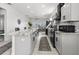 Well-equipped kitchen featuring a center island, stainless steel appliances, and modern finishes at 4440 58Th N Ave, St Petersburg, FL 33714