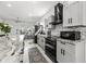Elegant kitchen featuring granite counters, stainless appliances, and ample cabinet space at 4440 58Th N Ave, St Petersburg, FL 33714