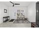 Cozy living room with stylish decor, bright natural light, and tile floors for easy maintenance at 4440 58Th N Ave, St Petersburg, FL 33714