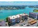 High-angle view of a waterfront condo building with stunning views of the bay and city skyline at 500 Treasure Island Cswy # 207, Treasure Island, FL 33706