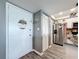 Bright kitchen features stainless steel appliances, granite counters, and luxury vinyl plank flooring at 500 Treasure Island Cswy # 207, Treasure Island, FL 33706