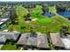Stunning aerial view of a community and a scenic golf course at 8940 Park Blvd # 8940A, Seminole, FL 33777
