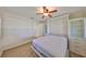 Bedroom includes a built-in murphy bed with desk and storage and a full size bed at 8940 Park Blvd # 8940A, Seminole, FL 33777