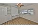 Bedroom includes a built-in murphy bed with desk and storage at 8940 Park Blvd # 8940A, Seminole, FL 33777