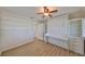 Bedroom includes a built-in murphy bed with desk and storage at 8940 Park Blvd # 8940A, Seminole, FL 33777