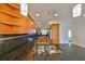 Modern kitchen featuring granite countertops, stainless steel appliances, and ample cabinet space at 8940 Park Blvd # 8940A, Seminole, FL 33777