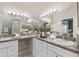 Bright bathroom with double vanity, granite countertops, and neutral decor, creating a clean and spacious feel at 9808 62Nd N Ter # 9808, St Petersburg, FL 33708