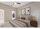 Comfortable bedroom featuring modern decor, soft lighting, and an ensuite bathroom for added convenience at 9808 62Nd N Ter # 9808, St Petersburg, FL 33708