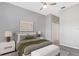Cozy bedroom with soft lighting, neutral tones, and a view of a closet for optimal relaxation at 9808 62Nd N Ter # 9808, St Petersburg, FL 33708