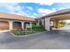 Well-maintained community recreation center entrance with mature landscaping at 9808 62Nd N Ter # 9808, St Petersburg, FL 33708