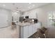 Modern eat-in kitchen with stainless steel appliances, granite countertops, and lots of natural light at 9808 62Nd N Ter # 9808, St Petersburg, FL 33708