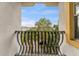 Balcony view showcasing palm trees, providing a scenic outdoor living space at 111 N Albany Ave # 3, Tampa, FL 33606