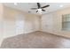 Spacious bedroom with neutral carpet, and closet at 111 N Albany Ave # 3, Tampa, FL 33606
