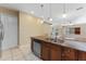 Open concept kitchen with granite countertops, stainless appliances, and large island at 111 N Albany Ave # 3, Tampa, FL 33606