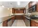 Kitchen with granite countertops, stainless steel appliances, and tile flooring at 111 N Albany Ave # 3, Tampa, FL 33606