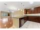 Open concept kitchen with stainless steel appliances and large island at 111 N Albany Ave # 3, Tampa, FL 33606