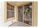 Walk-out patio with exterior window and sliding glass doors at 111 N Albany Ave # 3, Tampa, FL 33606