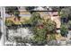 Drone shot exhibiting the property's layout, landscaping, and proximity to nearby streets and neighborhood at 1122 S Mulrennan Rd, Valrico, FL 33594
