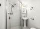 Bathroom featuring white vanity, tiled walls, and glass enclosed shower at 1122 S Mulrennan Rd, Valrico, FL 33594