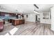 Spacious kitchen with a center island, pendant lighting, and stainless steel appliances at 1122 S Mulrennan Rd, Valrico, FL 33594