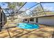 Refreshing screened pool with ample deck space, perfect for outdoor entertaining and enjoying warm weather at 1122 S Mulrennan Rd, Valrico, FL 33594