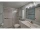 Clean bathroom with a sleek vanity, modern fixtures, and a glass-enclosed shower for convenience at 11620 Park Blvd # 308, Seminole, FL 33772