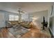 Bright living room boasts two sofas, stylish rug, and contemporary furniture for comfortable living at 11620 Park Blvd # 308, Seminole, FL 33772