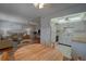 Open-concept living space with a dining area and a view into the kitchen at 11620 Park Blvd # 308, Seminole, FL 33772
