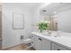 Bright bathroom features a double vanity, modern fixtures, and a glass-enclosed shower at 1208 E Kennedy Blvd # 1019, Tampa, FL 33602