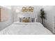 Bedroom featuring a plush bed with decorative pillows and modern decor at 1208 E Kennedy Blvd # 1019, Tampa, FL 33602