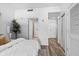 Bright bedroom features a walk-in closet and bathroom entrance at 1208 E Kennedy Blvd # 1019, Tampa, FL 33602