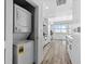 Modern kitchen with white cabinetry, and stainless steel appliances; washer and dryer included at 1208 E Kennedy Blvd # 1019, Tampa, FL 33602