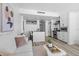 Open-concept living room and kitchen area with modern finishes and plenty of natural light at 1208 E Kennedy Blvd # 1019, Tampa, FL 33602