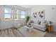 Well-lit living room features modern decor and large windows with city views at 1208 E Kennedy Blvd # 1019, Tampa, FL 33602