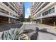 East and West Parking Garage Entrance with well maintained landscaping at 1208 E Kennedy Blvd # 1019, Tampa, FL 33602