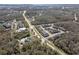 Aerial view of neighborhood featuring townhomes, park, community center, and water at 1308 Syrah Dr, Oldsmar, FL 34677