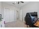 Bedroom with carpet flooring, ceiling fan, natural lighting, and closet at 1308 Syrah Dr, Oldsmar, FL 34677
