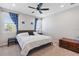 Bedroom with a queen sized bed, ceiling fan and carpet flooring at 1308 Syrah Dr, Oldsmar, FL 34677