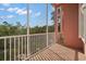 Enjoy the outdoors in this relaxing screened balcony with lush greenery and a tranquil view at 14584 El Paseo Dr, Seminole, FL 33776
